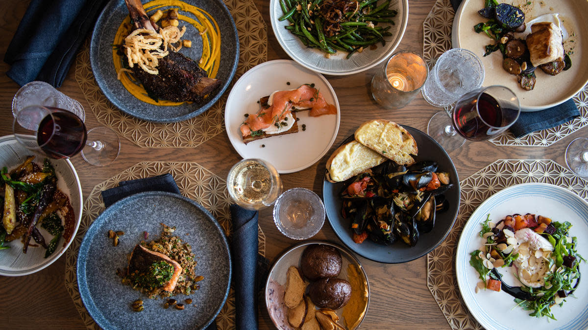 A table full of dishes from Aria -- The Restaurant at Saint Kate