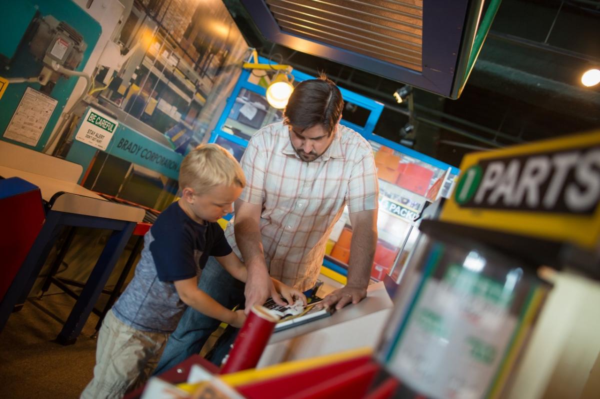 Father and son playing at Betty Brinn Children's Museum