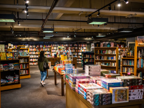 rows of shelves and tables of books