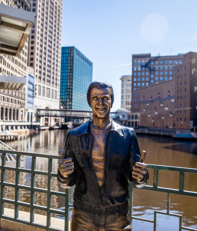 a bronze statue of the Happy Days character The Fonz on the Milwaukee RiverWalk