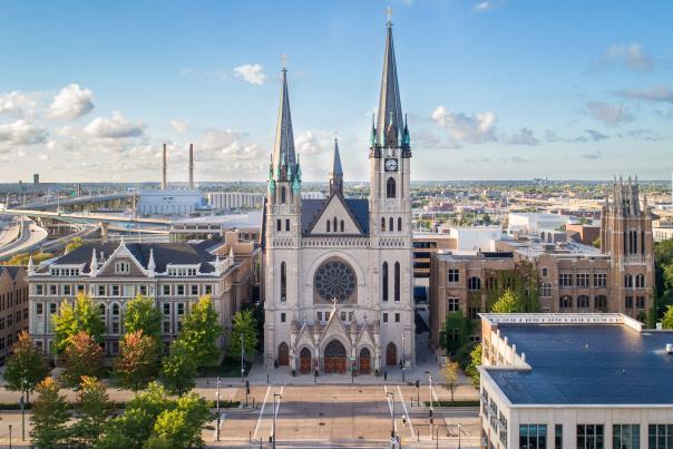 drone photo of Gesu Church on the Marquette University campus