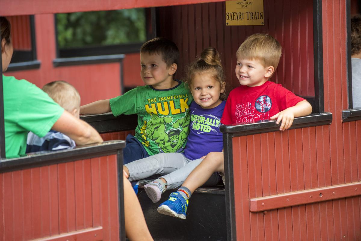 A family on the train at the Milwaukee County Zoo
