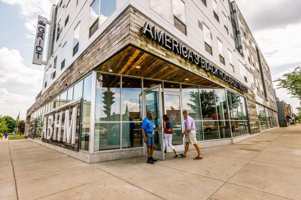 people walking into the American Black Holocaust Museum