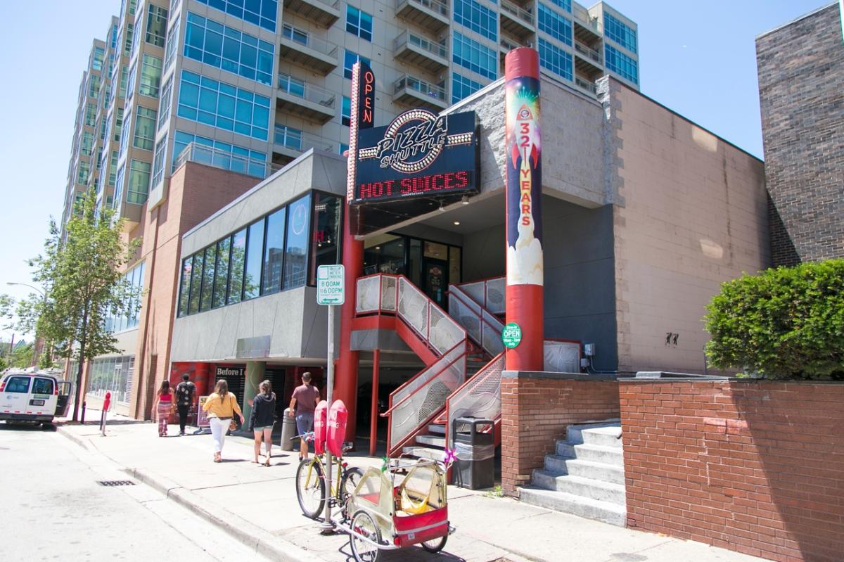 Exterior of Pizza Shuttle on a bright, sunny day