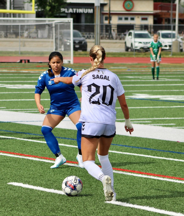 female soccer player with ball